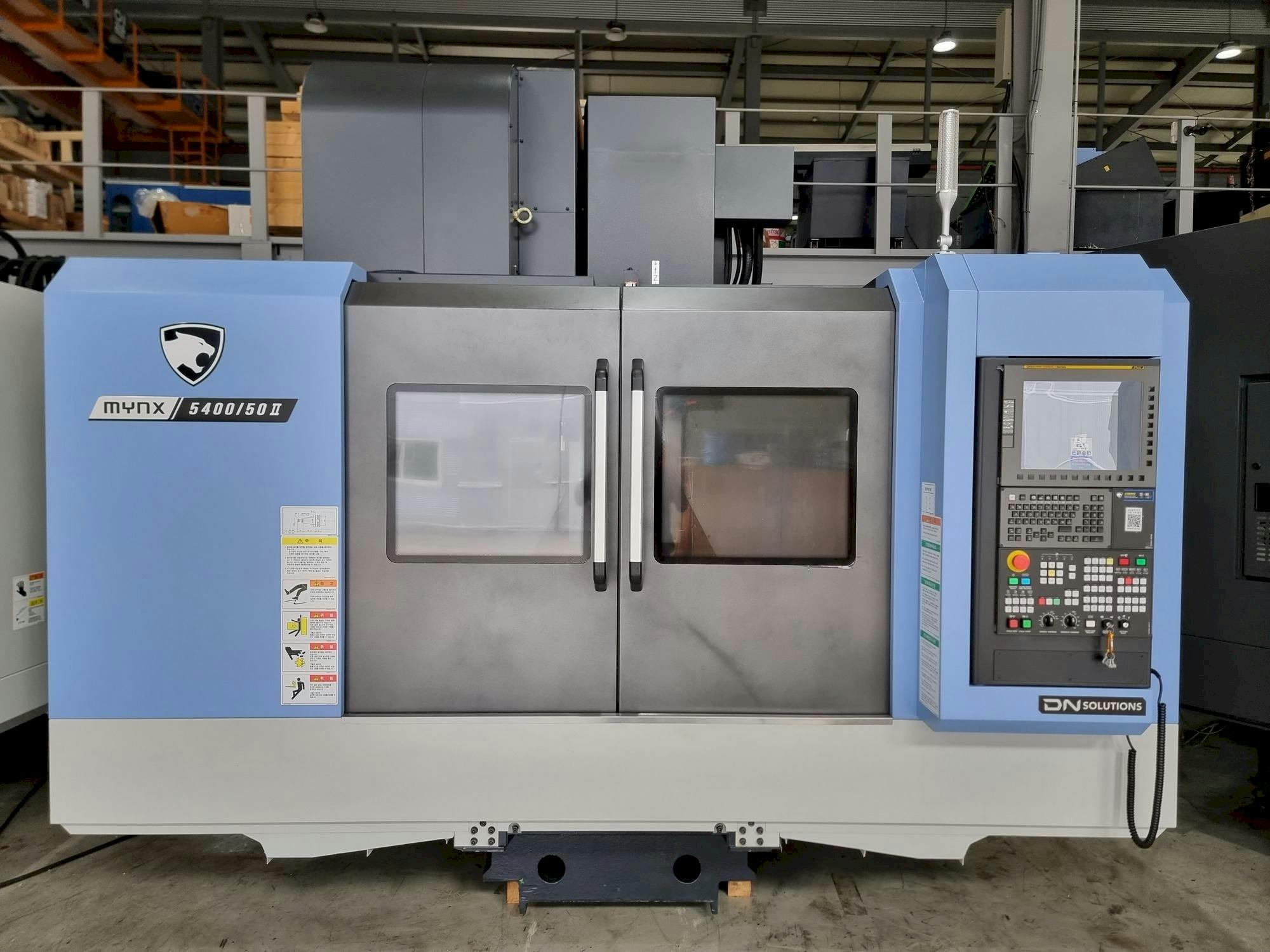 Mašīnas DOOSAN MYNX 5400/50  pretskats